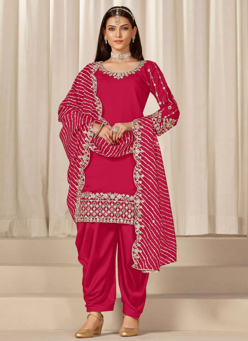 Vibrant rani chanderi silk patiala suit with mirror embroidery