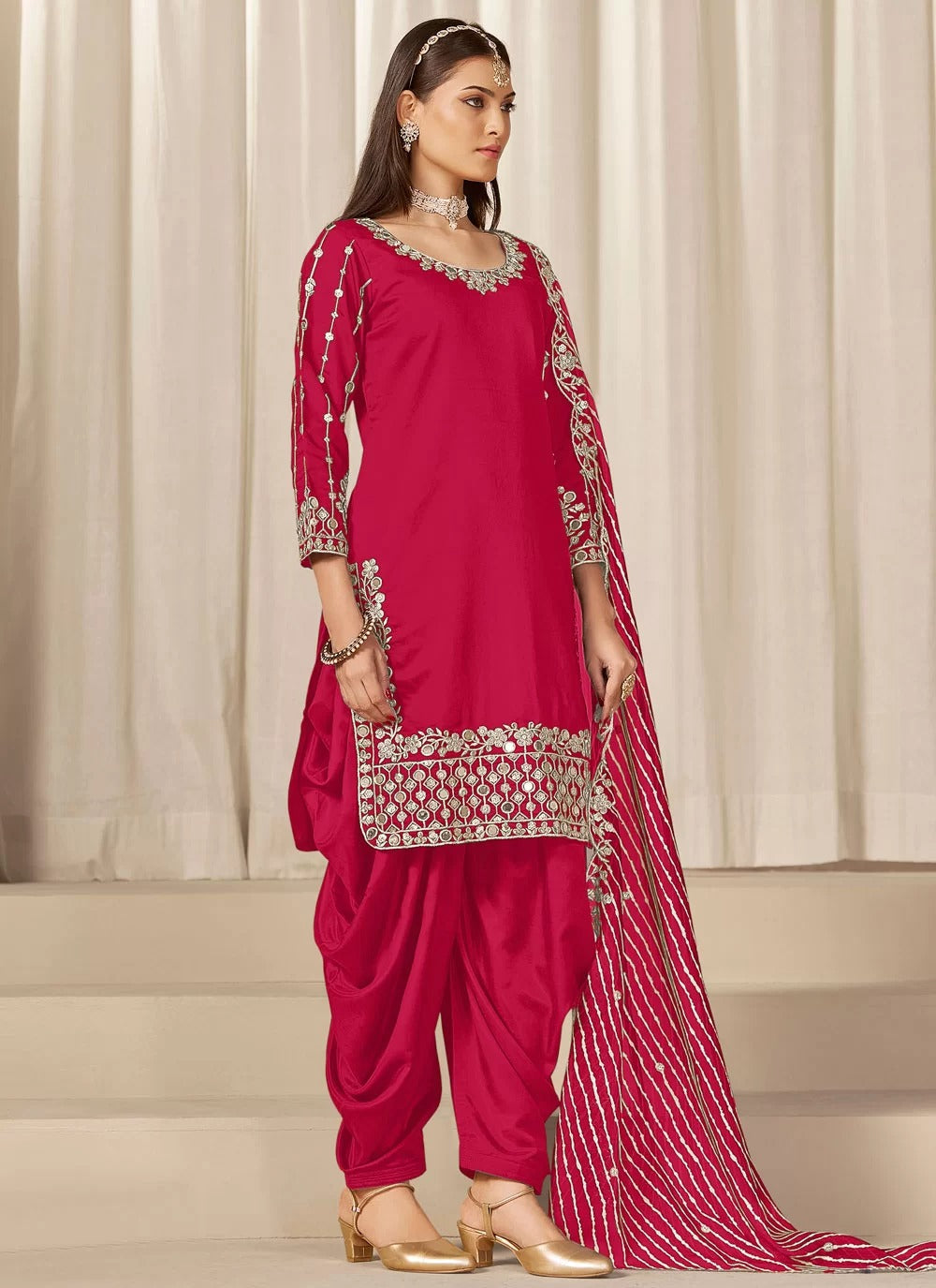 Vibrant rani chanderi silk patiala suit with mirror embroidery