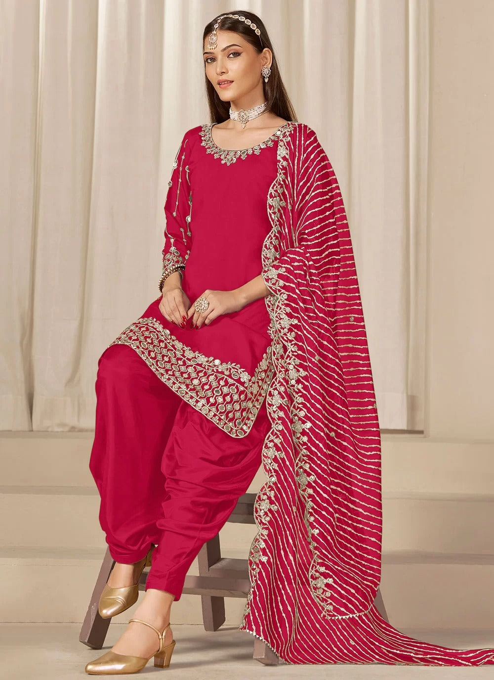 Vibrant rani chanderi silk patiala suit with mirror embroidery