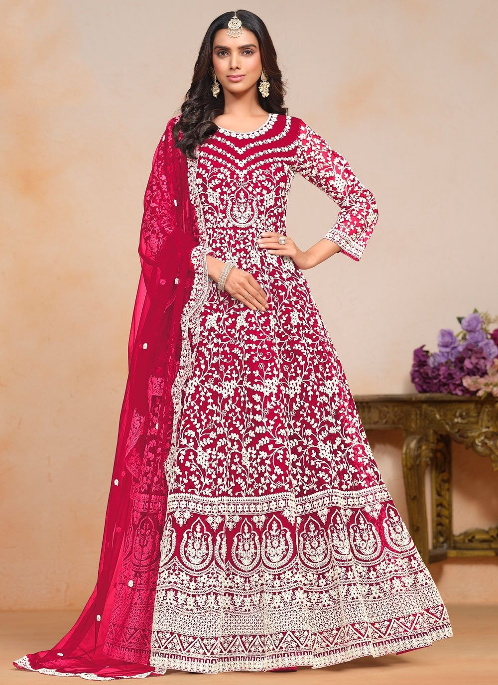 Radiant rani pink anarkali suit in net with embroidered dupatta