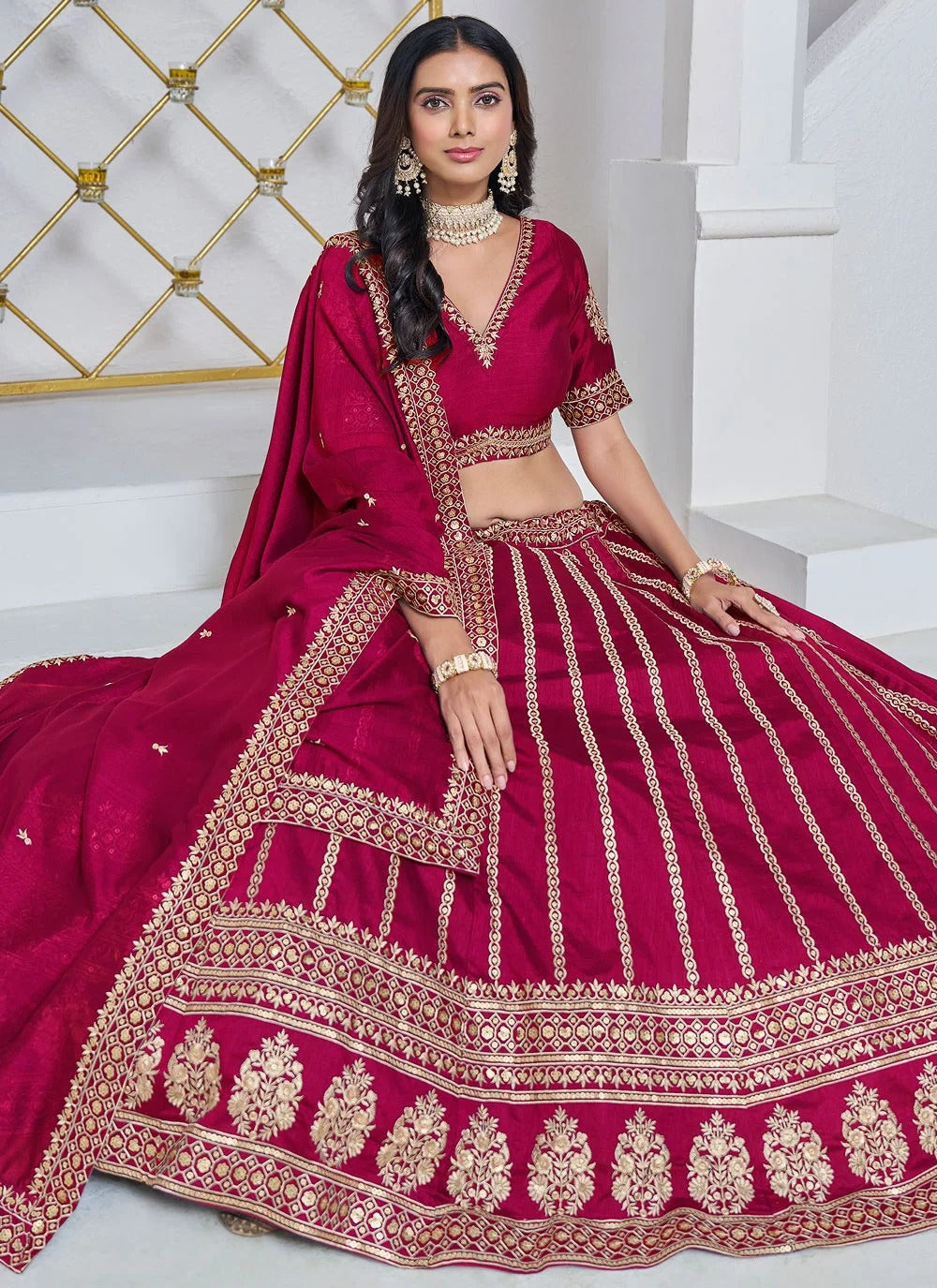 Rani pink lehenga for wedding in art silk with embroidery