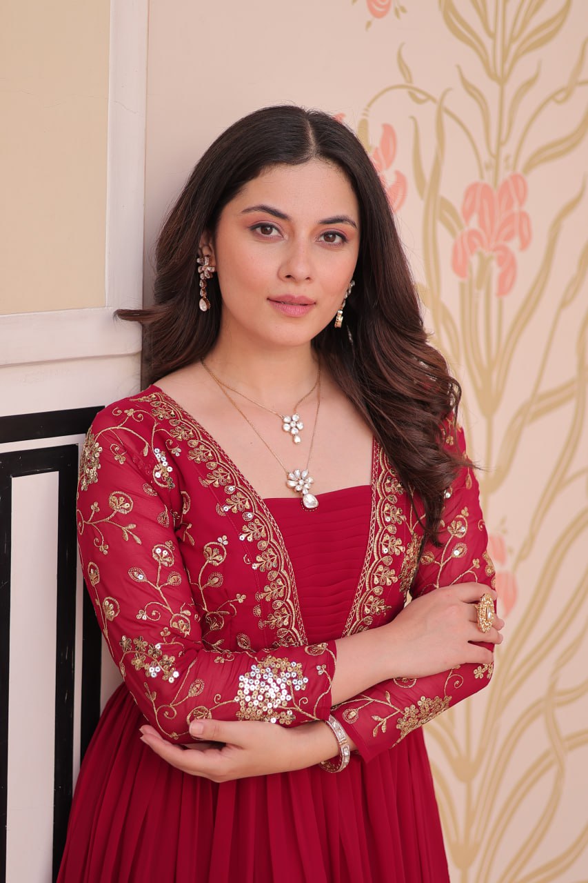 Rani Pink Faux Blooming Fabric Embroidered Gown with 12-Meter Flair & Fancy V-Neck Design