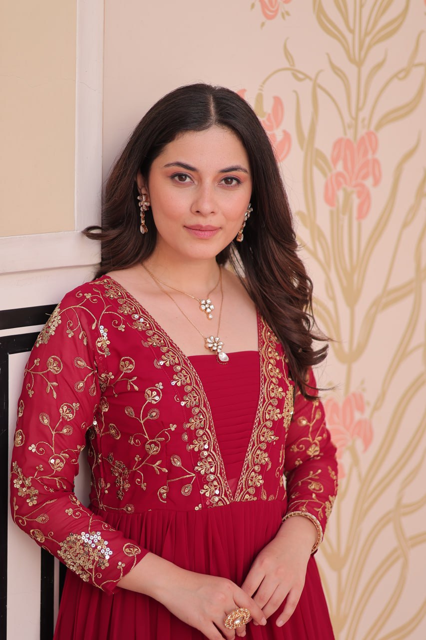 Rani Pink Faux Blooming Fabric Embroidered Gown with 12-Meter Flair & Fancy V-Neck Design