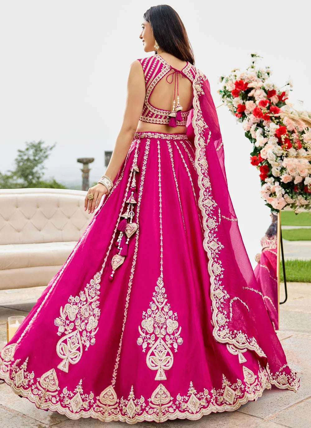 Rani pink silk wedding lehenga with sequins zari embroidery