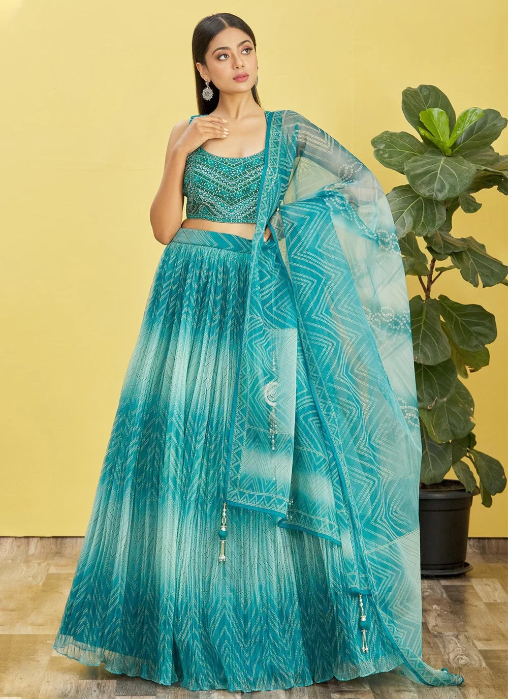 Real mirror work party wear blue lehenga in organza
