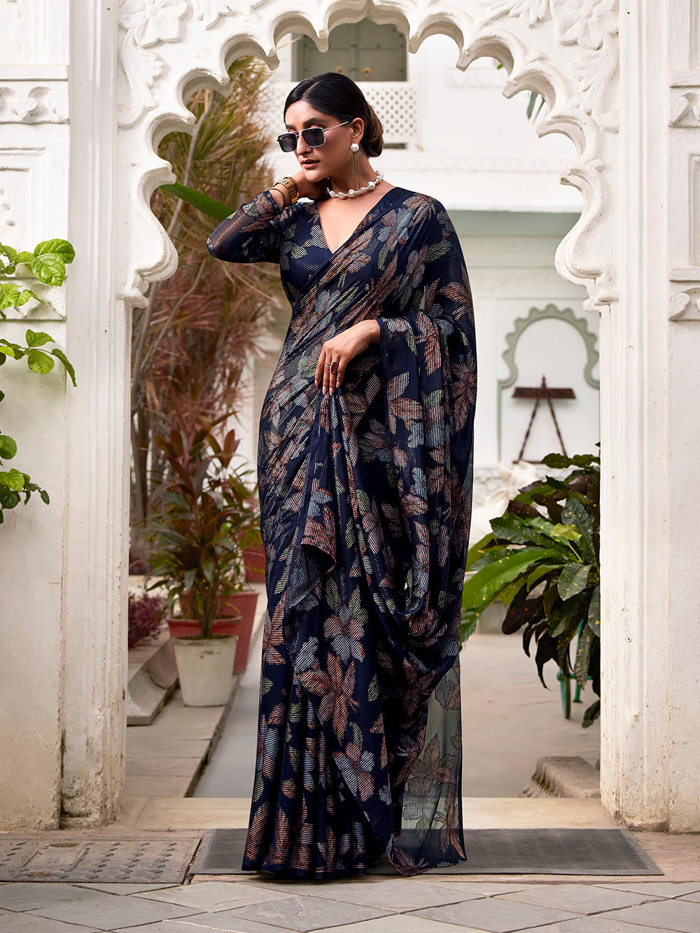 Navy blue lurex brasso saree with floral viscose work matching blouse