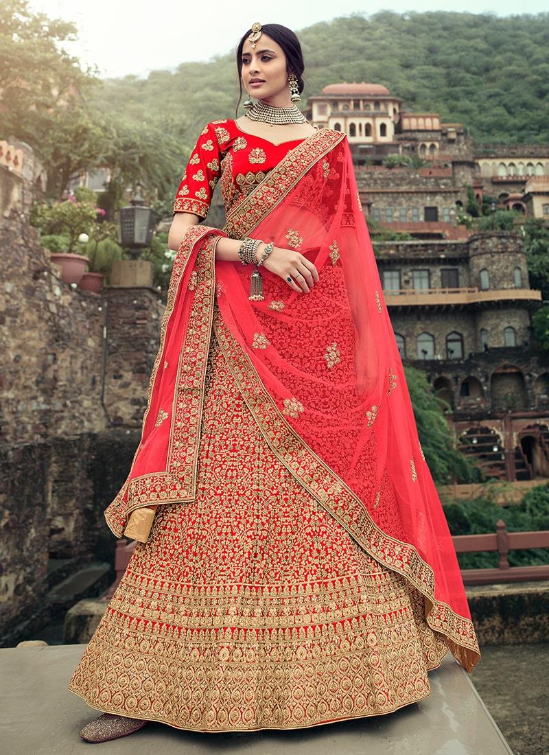 Red Color Zari And Stone Work Satin Fabric Wedding Wear Lehenga