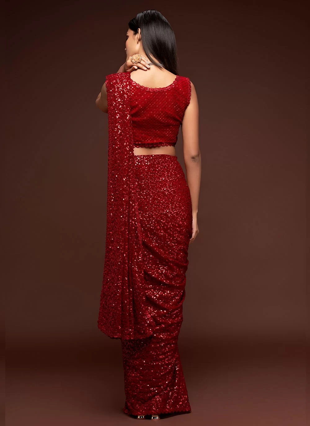 Red thread and multiple sequins embroidery saree