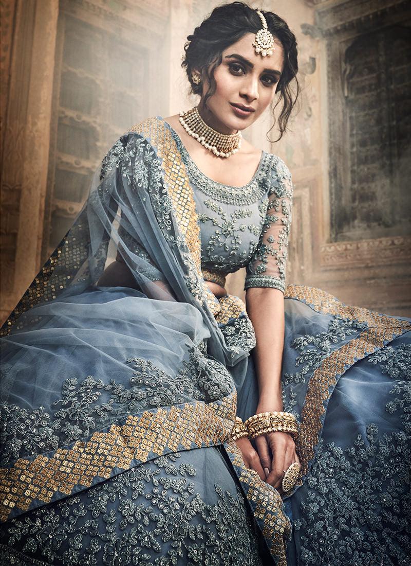 Remarkable Dark Grey Colored Soft Net Designer Flared Lehenga Choli