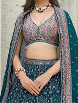 Remarkable Teal Blue Sequins Georgette Lehenga Choli With Dupatta