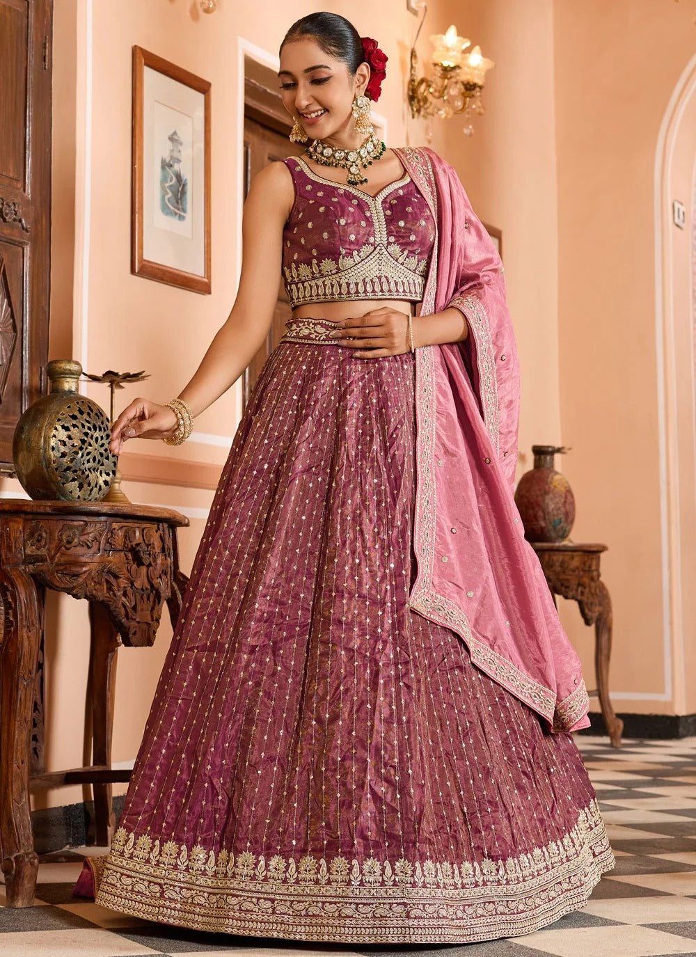 Luxury rose gold engagement lehenga in tissue silk with zari embroidery