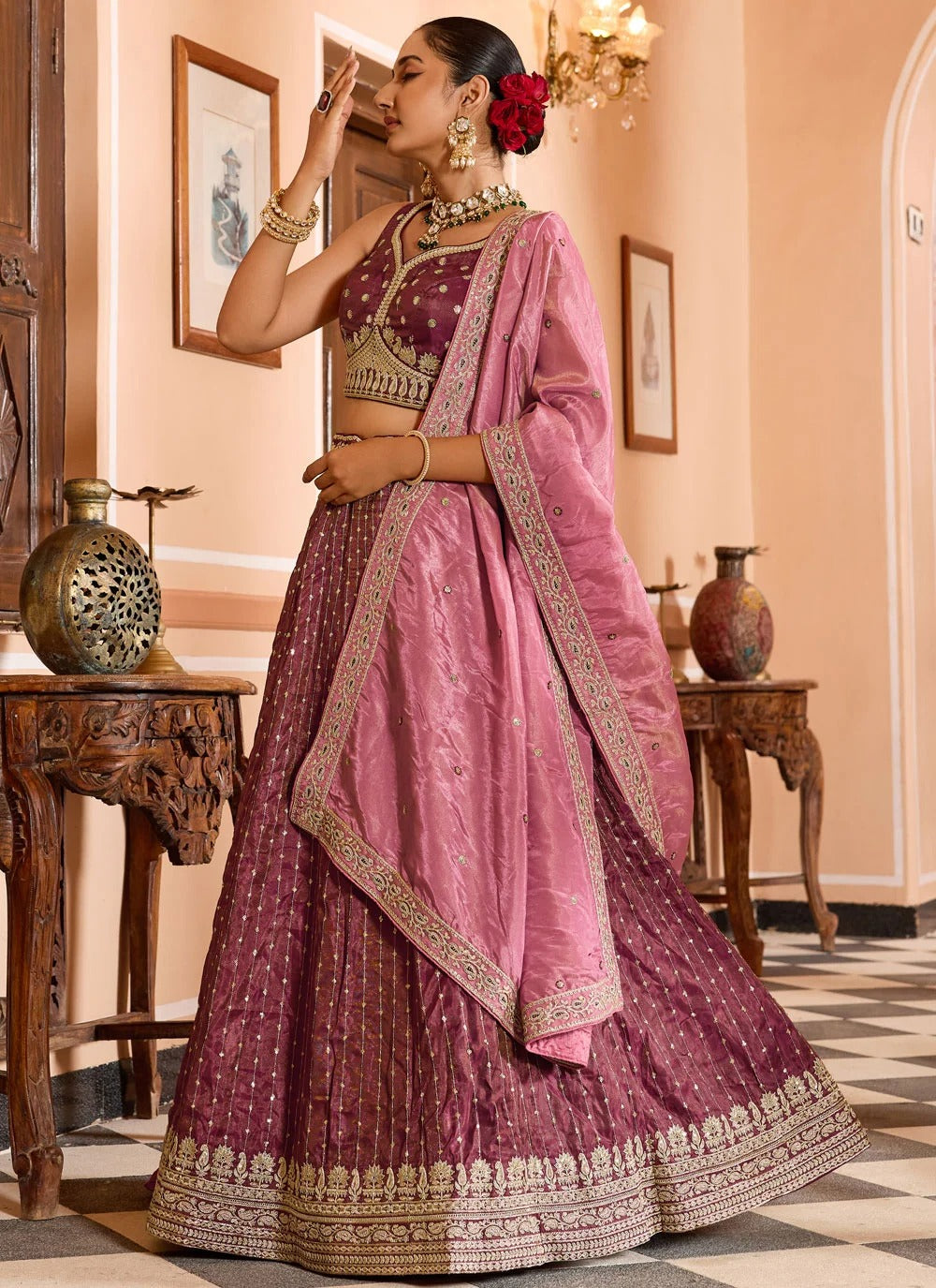 Luxury rose gold engagement lehenga in tissue silk with zari embroidery