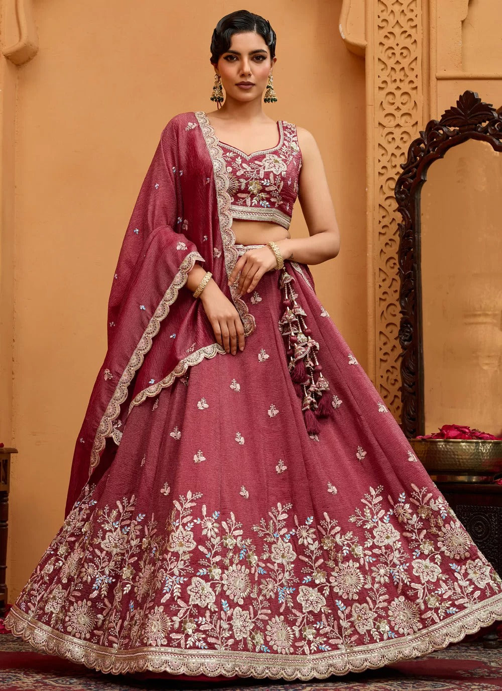 Opulent rosegold tissue lehenga with sequin stone embroidery