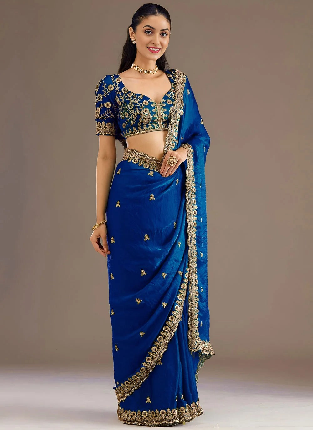 Royal blue reception wear tissue saree with zari embroidery