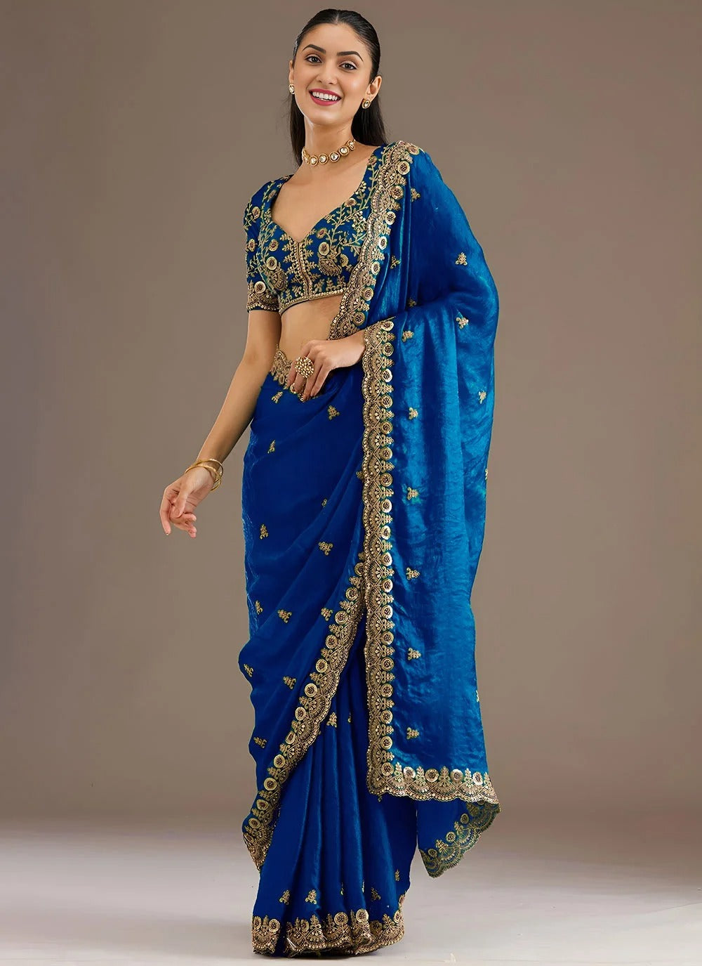Royal blue reception wear tissue saree with zari embroidery