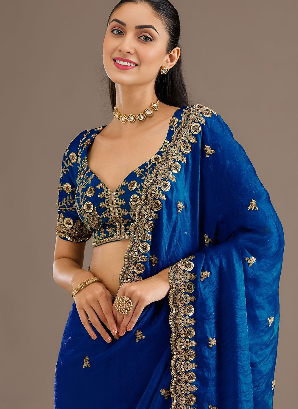 Royal blue reception wear tissue saree with zari embroidery