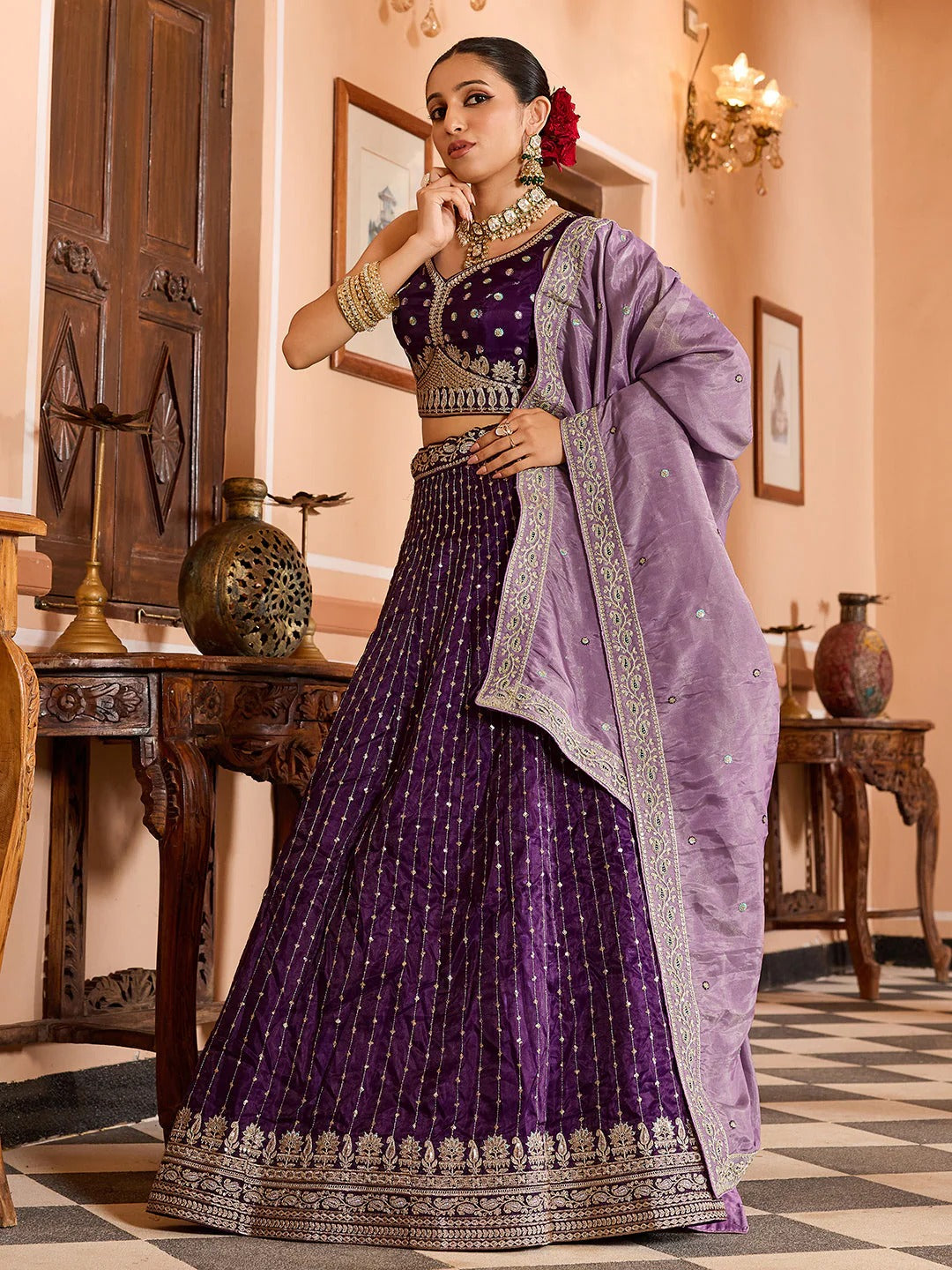 Royal purple engagement lehenga in tissue silk with zari sequins embroidery