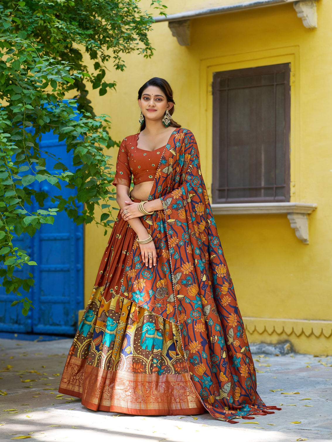 Rust orange color foil work lehenga choli