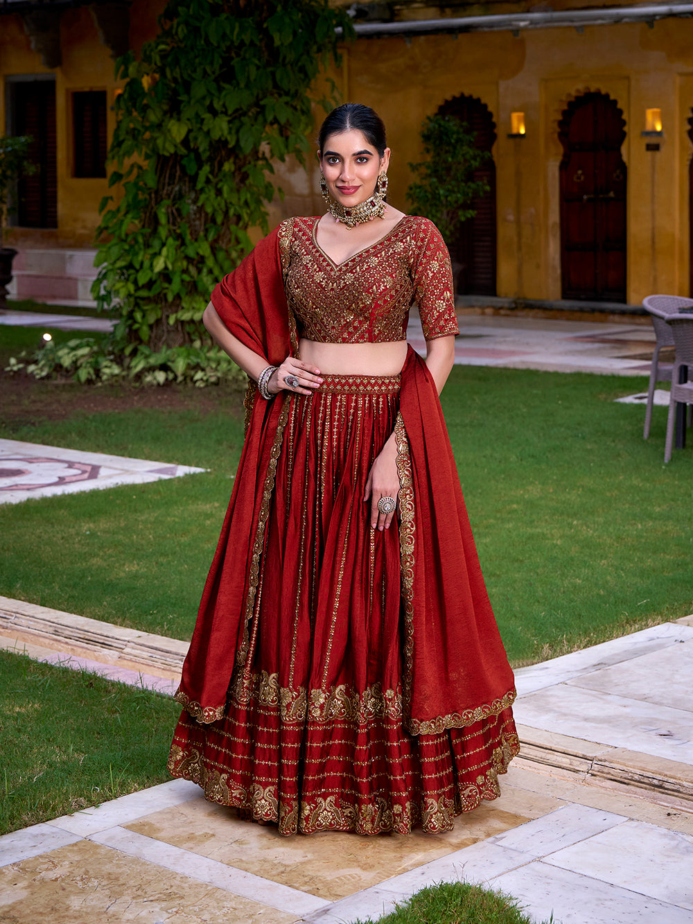 Rust orange rangoli crush party wear lehenga choli with sequins thread embroidery