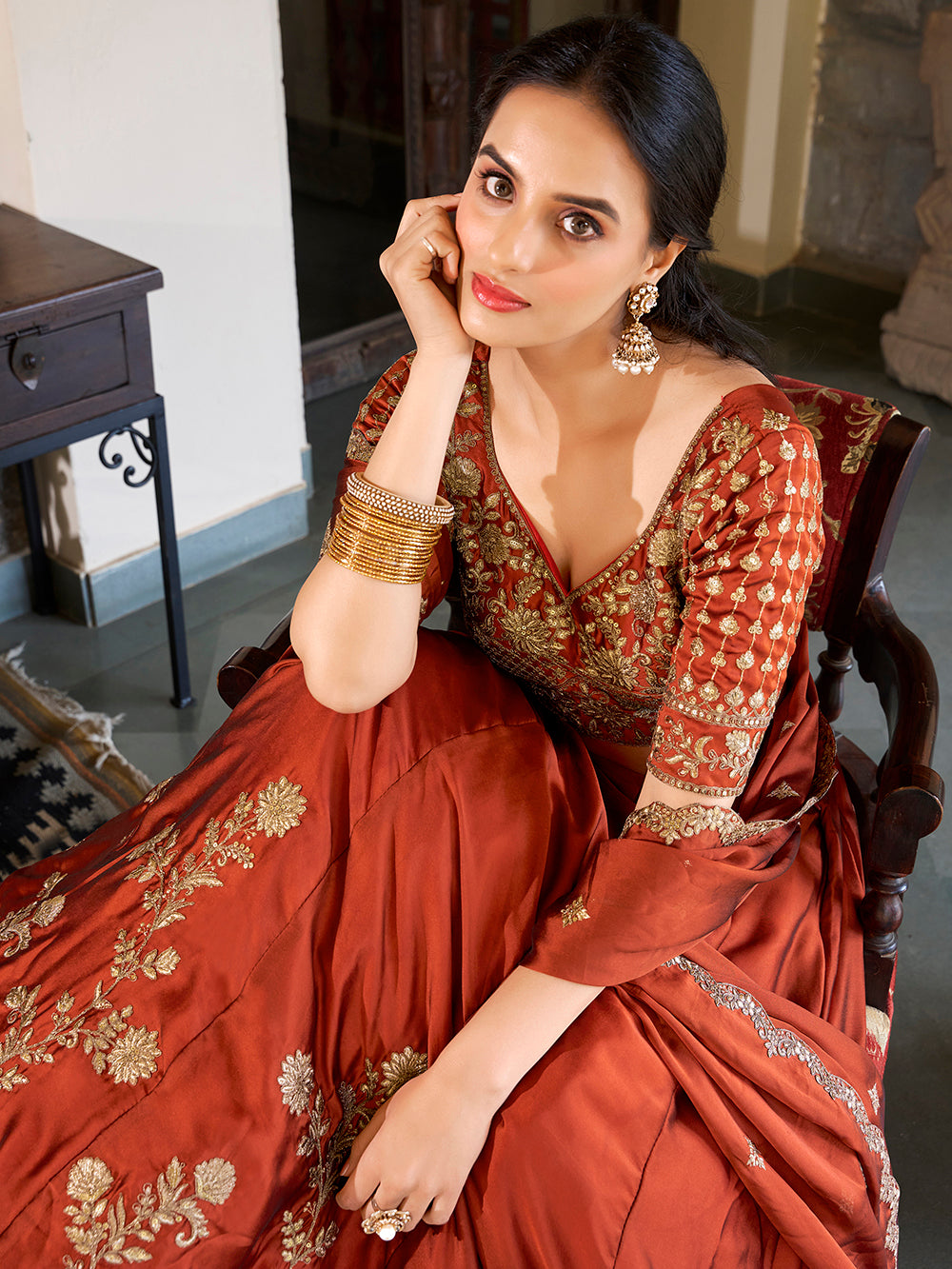 Wedding wear rust orange rangoli silk lehenga choli with sequins thread embroidery