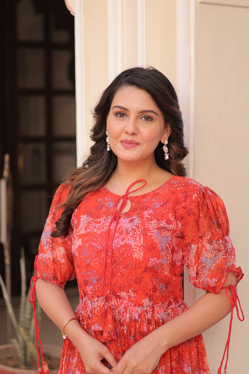 Rust Printed Faux Georgette Anarkali Gown with 7-Meter Flair and Bell Sleeves