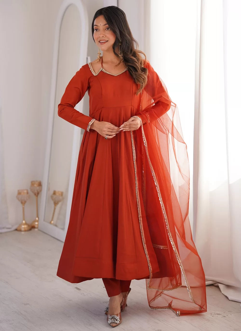 Rust roman silk chanderi anarkali suit with net dupatta for sangeet festive wear