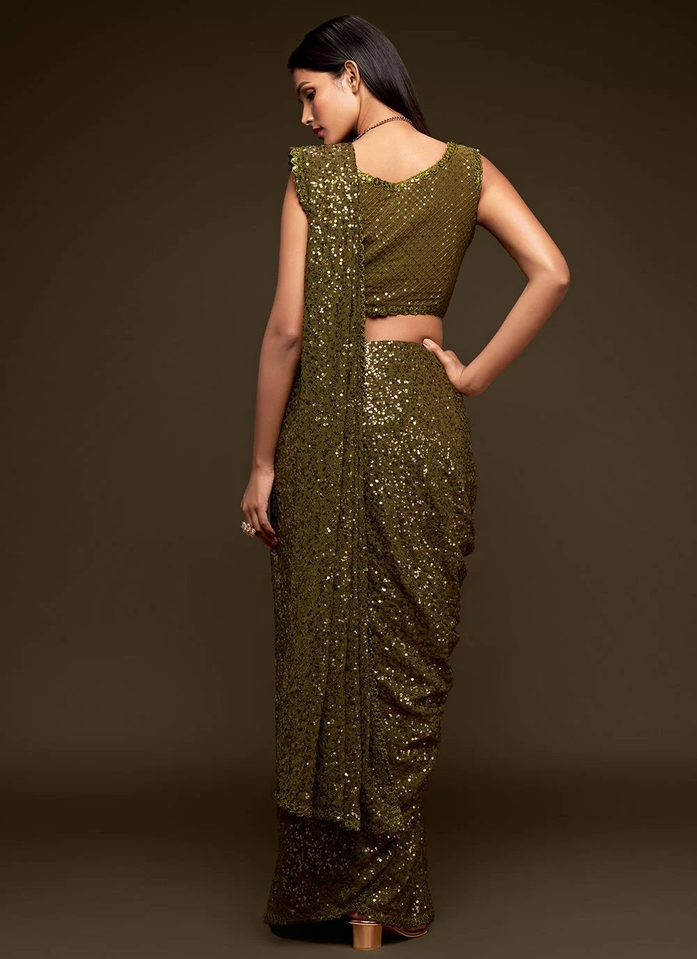 Sabyasachi olive green sequins georgette party wear saree with blouse