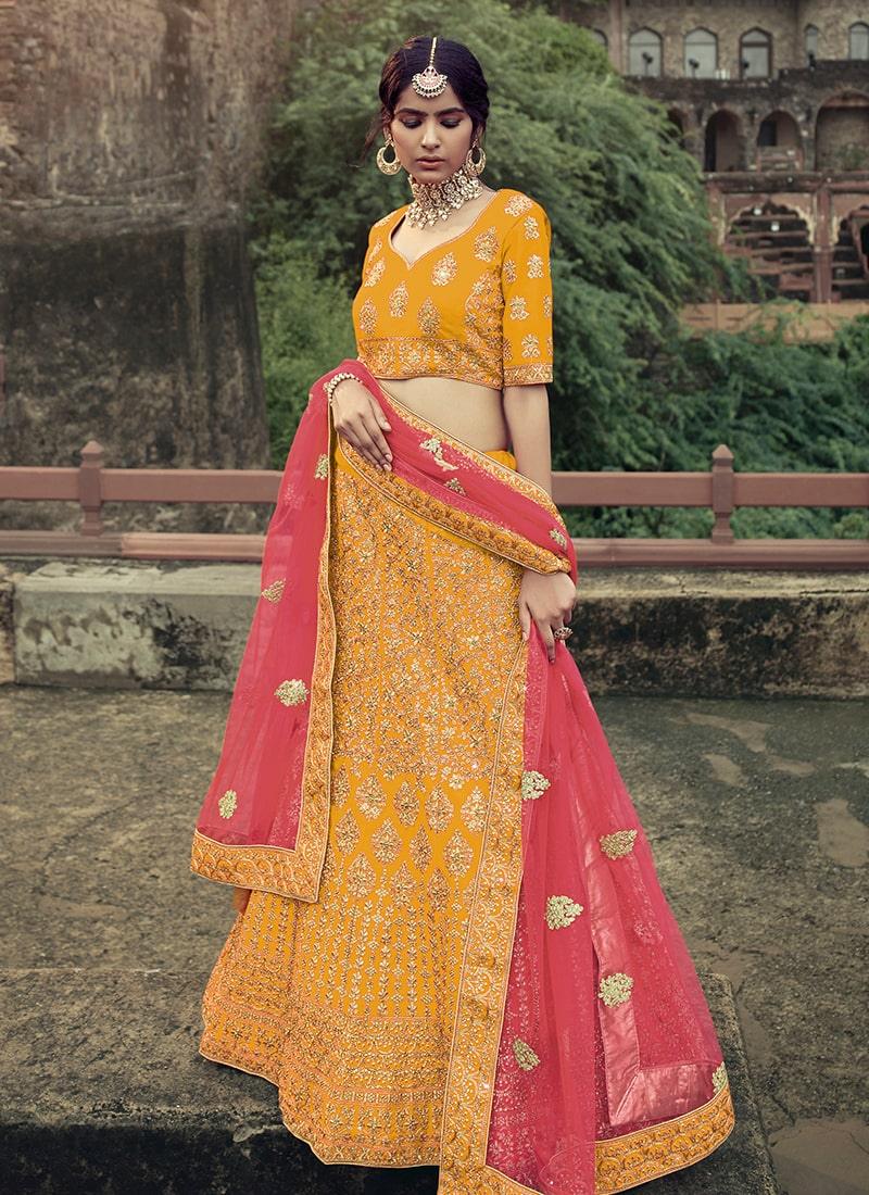 Satin Fabric Mustard Yellow Color Zari Work Panelled Lehenga Choli