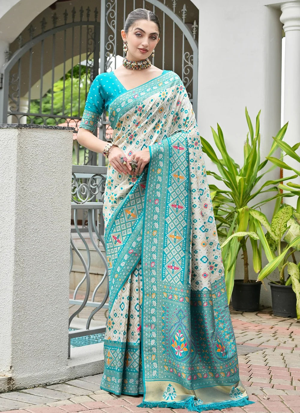 Sea green banarasi silk patola saree with ajrakh zari weaving pallu