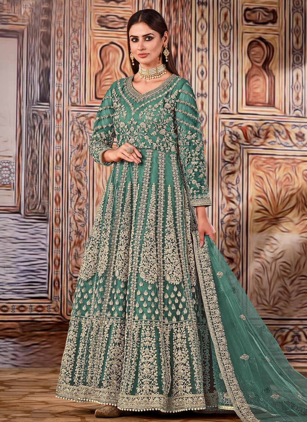 Sea green net embroidered floor length salwar kameez