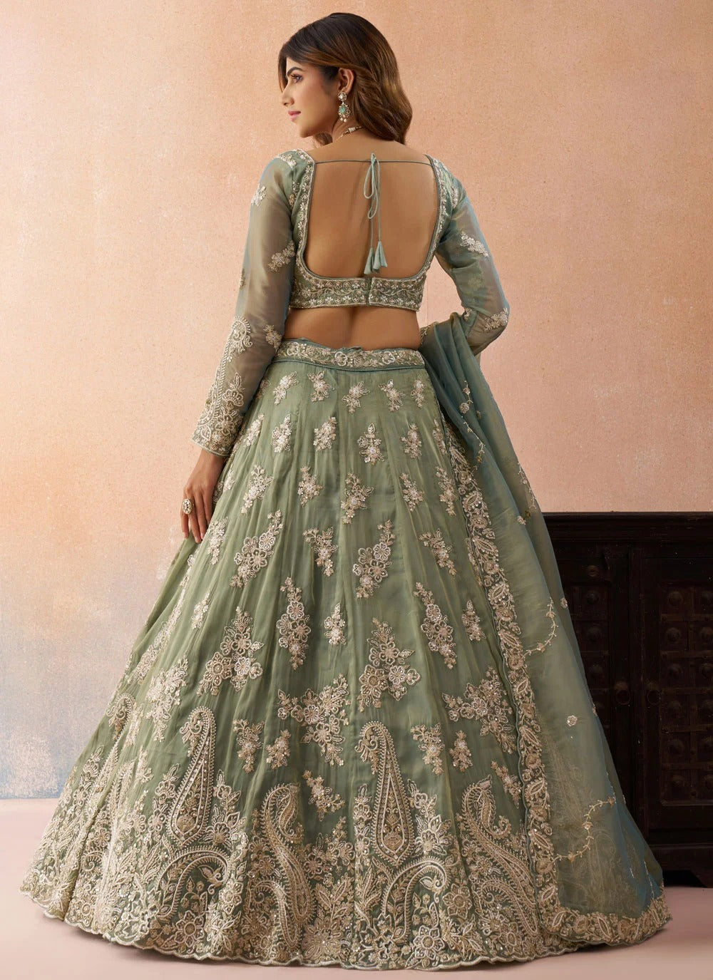 Sea green tissue lehenga with sequins thread embroidery