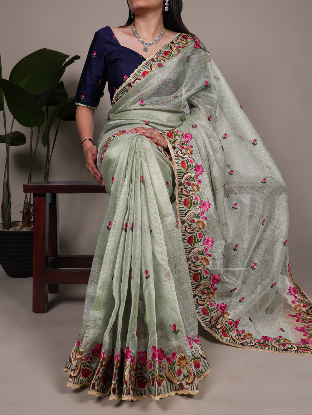 Sea green zari kota tissue saree with floral thread embroidery and banglory blouse fabric