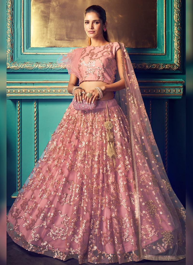 Sensational Coral Pink Soft Net Sequin And Zari Work Lehenga Choli