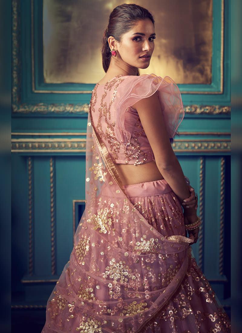 Sensational Coral Pink Soft Net Sequin And Zari Work Lehenga Choli