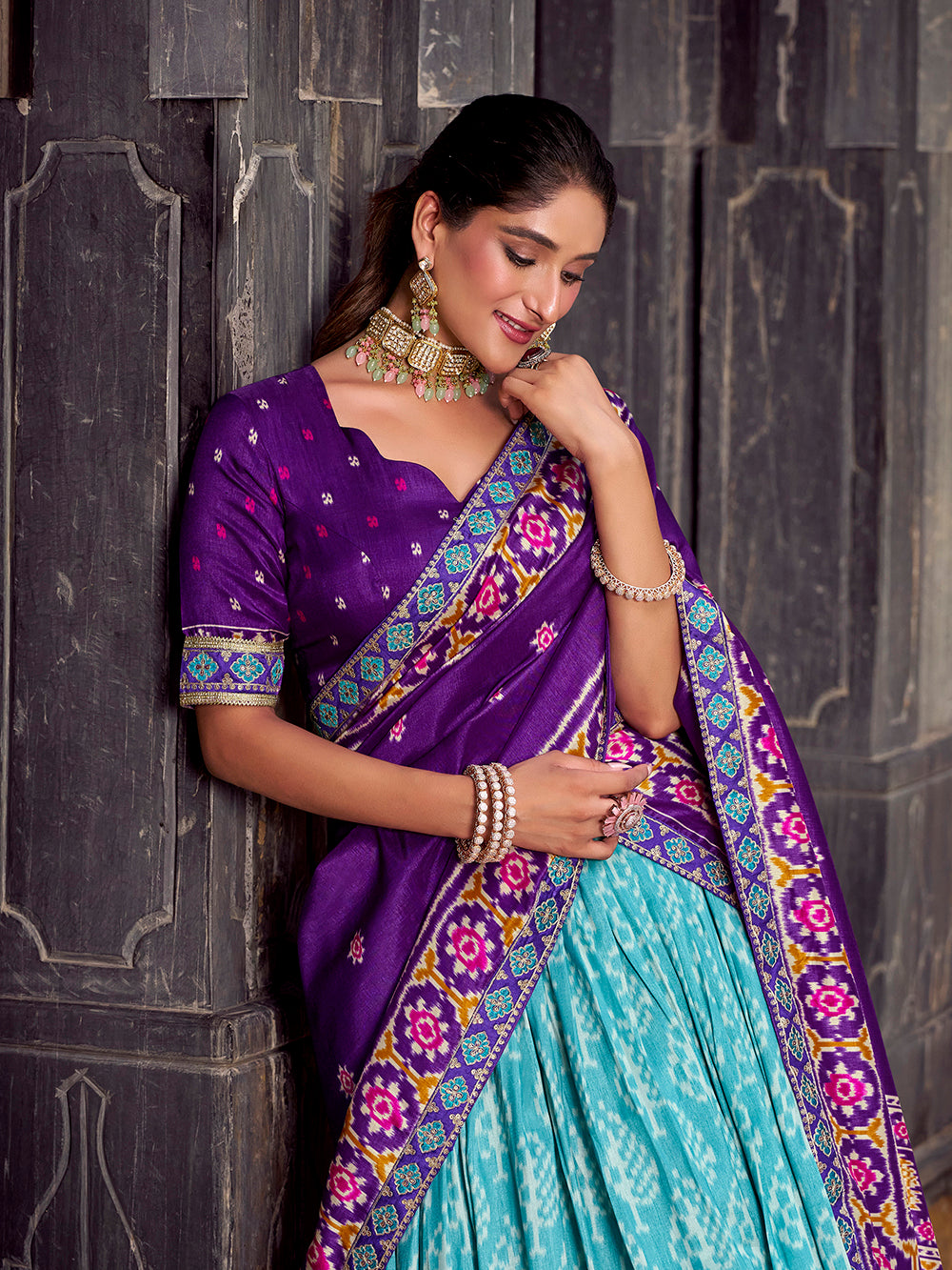 Sky blue tasar silk ikat patola print lehenga choli with purple embroidered blouse dupatta