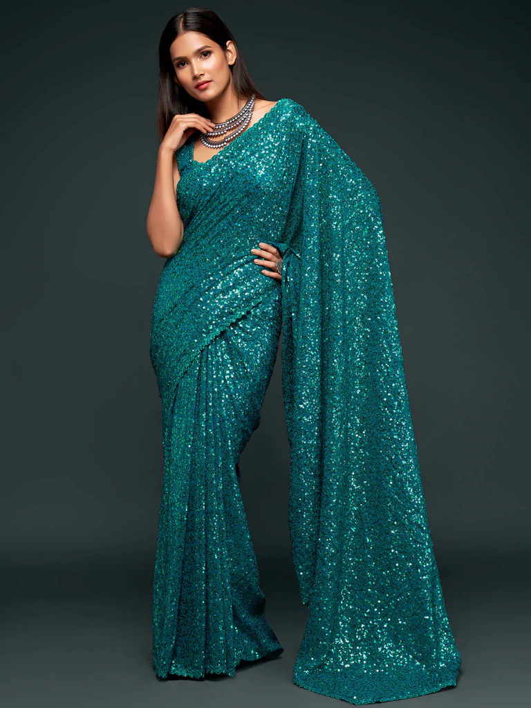 Sequinned georgette saree in teal blue