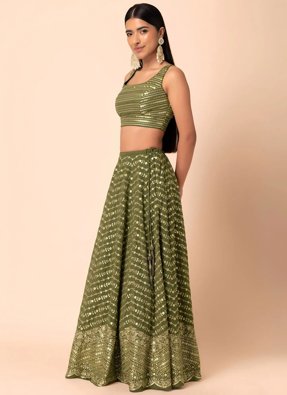 Emerald green engagement lehenga in georgette with sequins embroidery