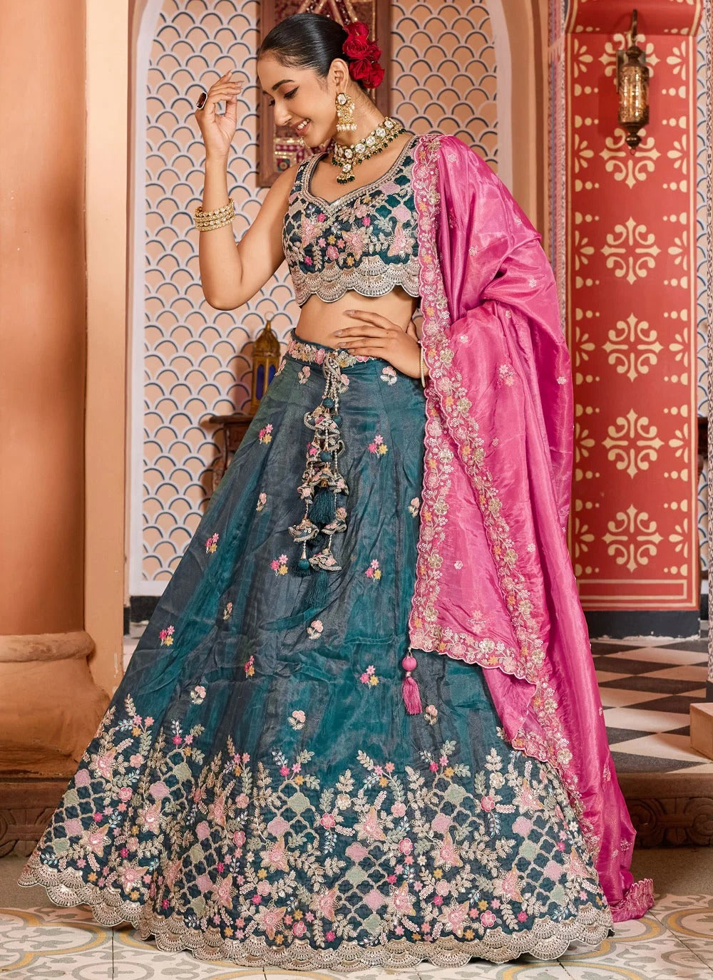 Teal tissue bridesmaid lehenga with sequins stone coding embroidery