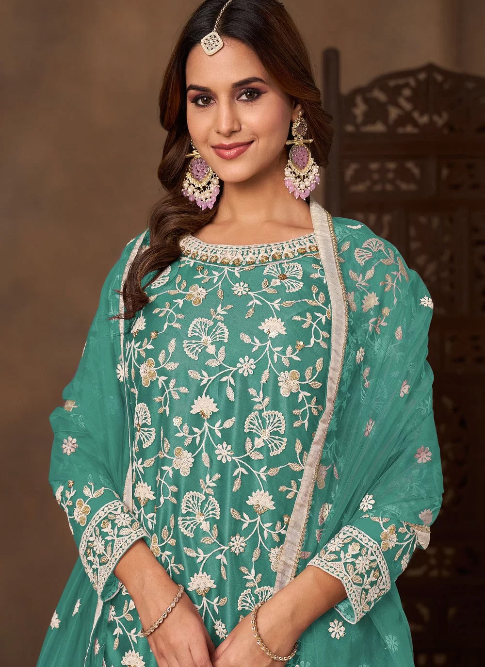 Serene sea green net embroidered palazzo suit for festive wear