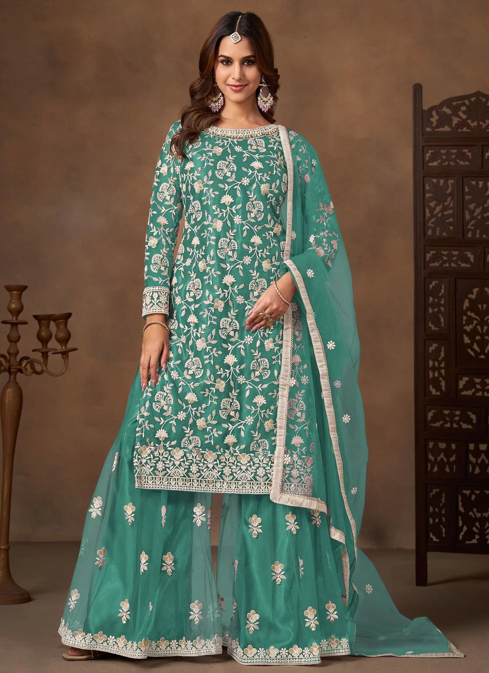 Serene sea green net embroidered palazzo suit for festive wear