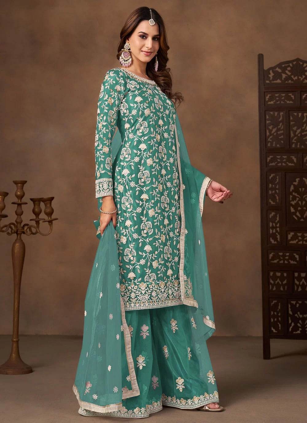 Serene sea green net embroidered palazzo suit for festive wear