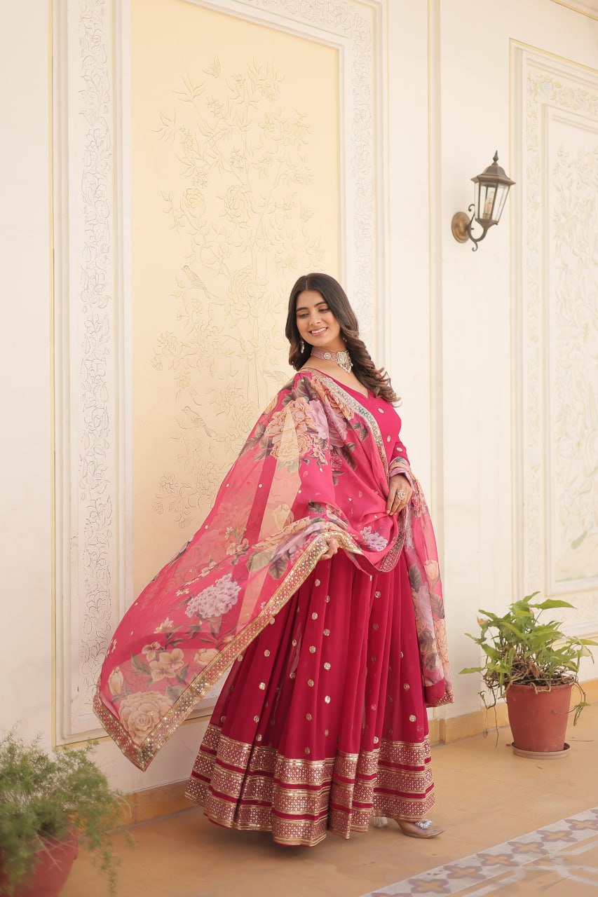 Shimmering Faux Georgette Embroidered Rani Pink Gown with Sequin Accents