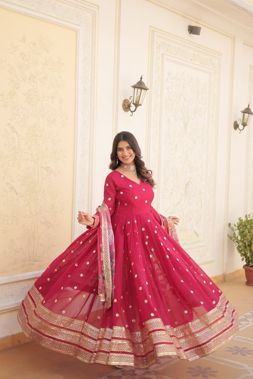 Shimmering Faux Georgette Embroidered Rani Pink Gown with Sequin Accents