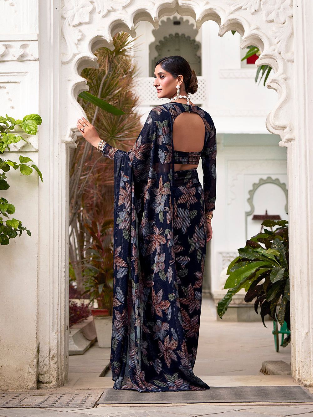 Navy blue lurex brasso saree with floral viscose work matching blouse