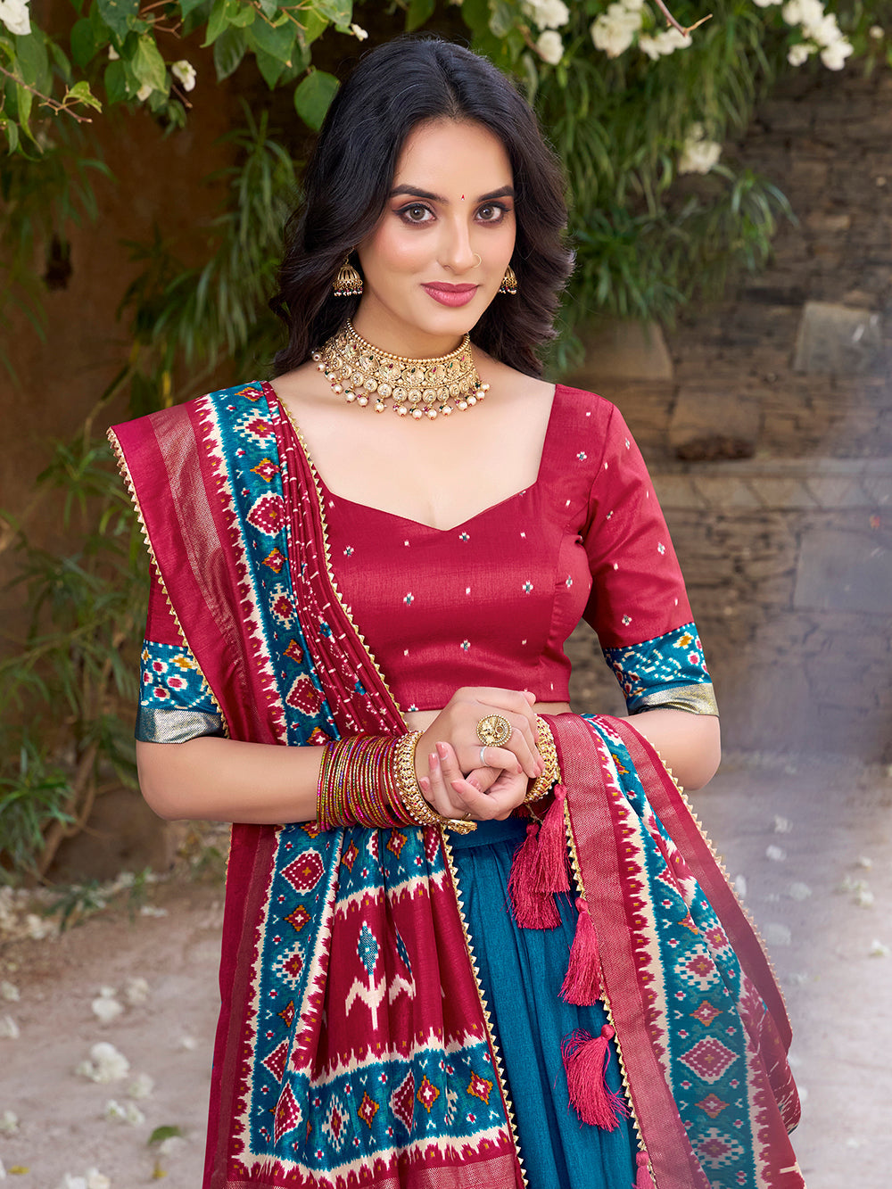Teal tasar silk lehenga choli with patola print foil work matching dupatta