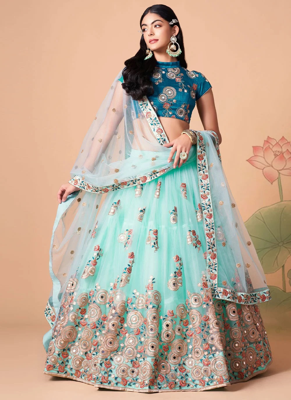 Sky blue gorgeous net lehenga with gold zari and dori embroidery
