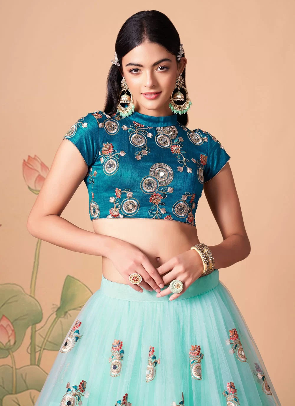 Sky blue gorgeous net lehenga with gold zari and dori embroidery