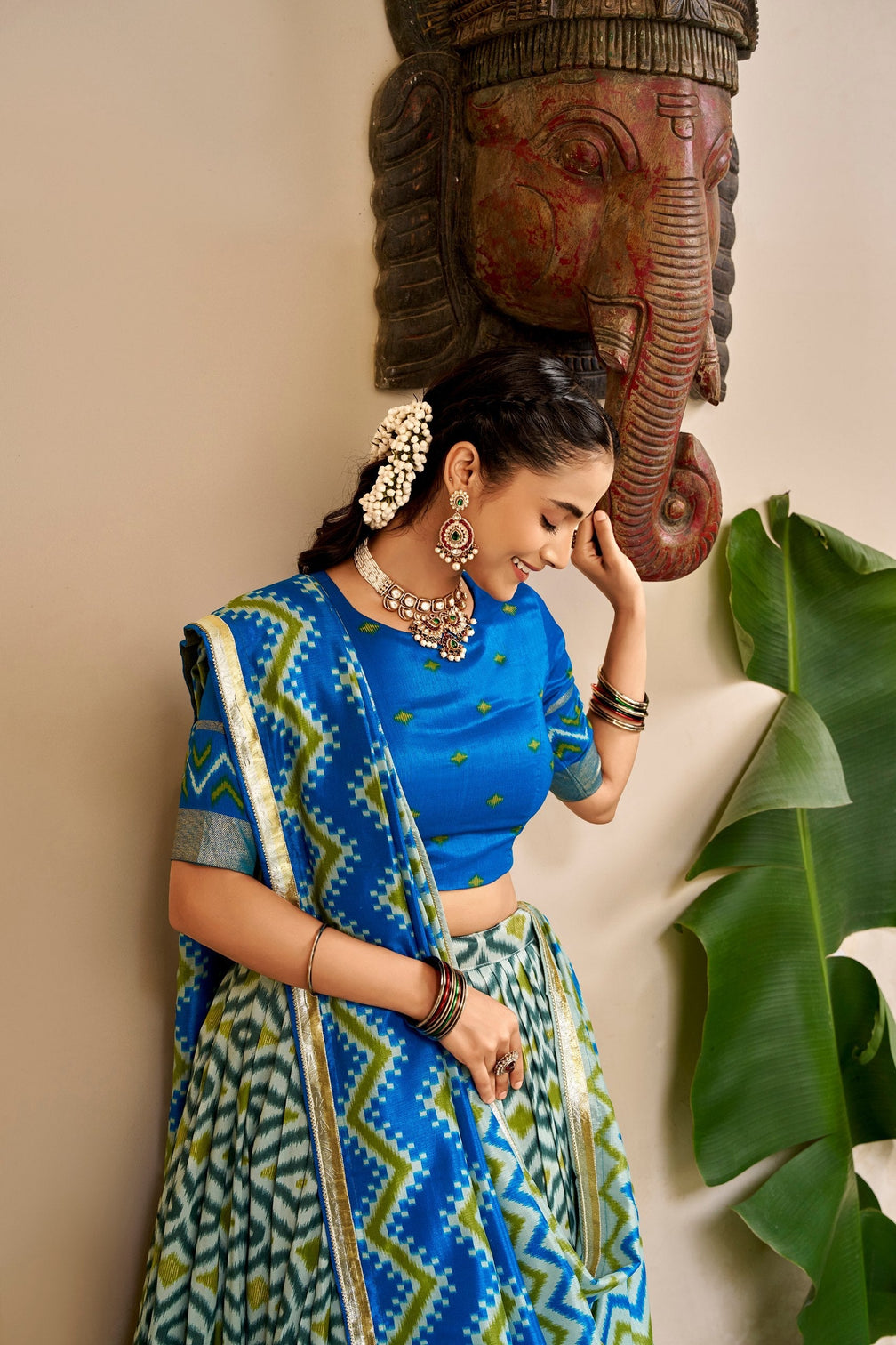 Sky Blue Silk Print Lehenga with Lace Dupatta