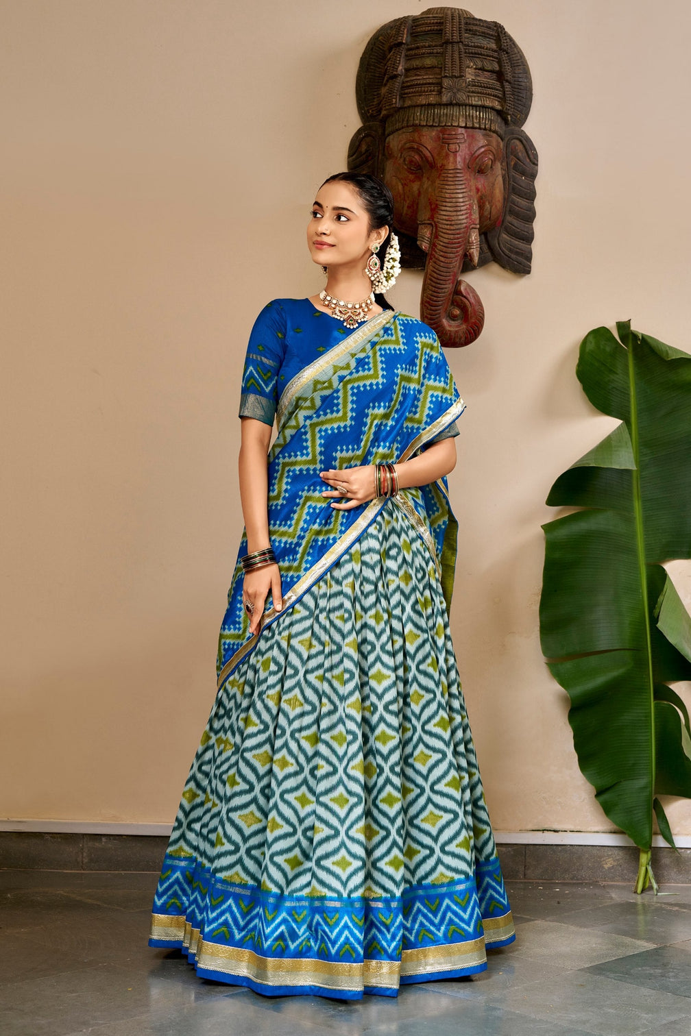 Sky Blue Silk Print Lehenga with Lace Dupatta