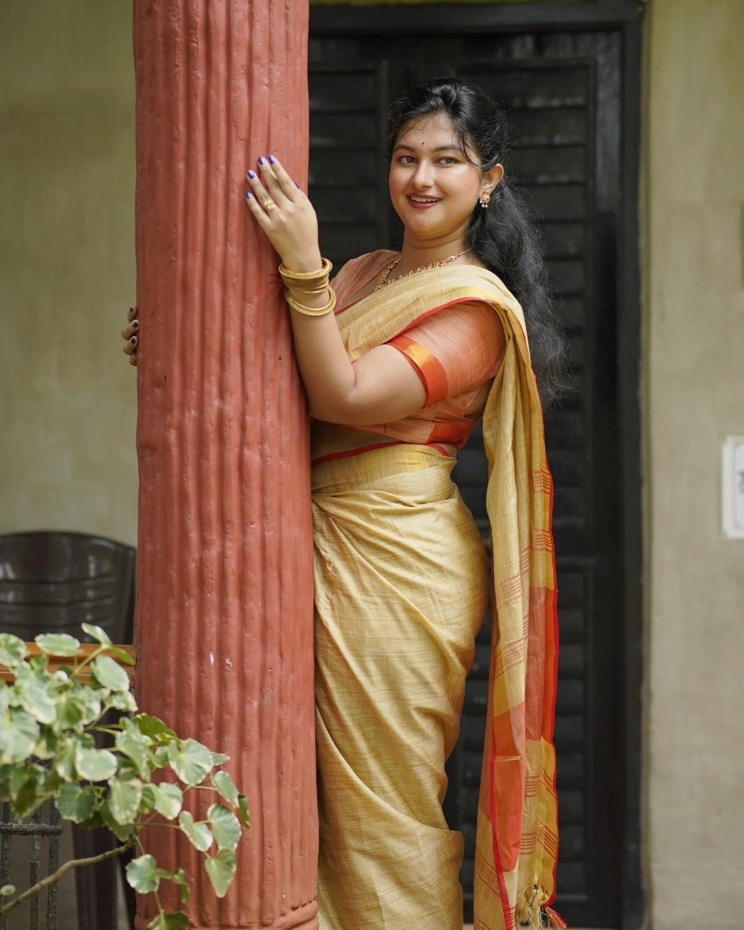 Elegant beige soft tissue saree with red border matching blouse piece